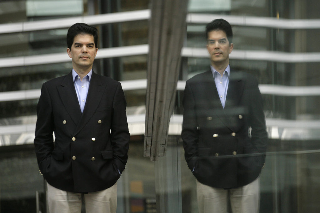 FILE - David Webb, a corporate governance activist poses for a photo after an interview with The Associated Press in Hong Kong, Tuesday, March 11, 2008. (AP Photo/Vincent Yu, File)