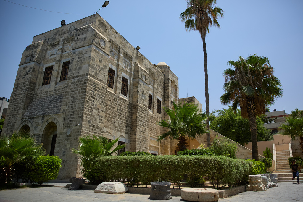 FILE – Archaeological columns are displayed outside the Pasha Palace, a museum housing artifacts that was later damaged in the Israel-Hamas war, in Gaza City, Tuesday, July 16, 2019. (AP Photo/Khalil Hamra, File)