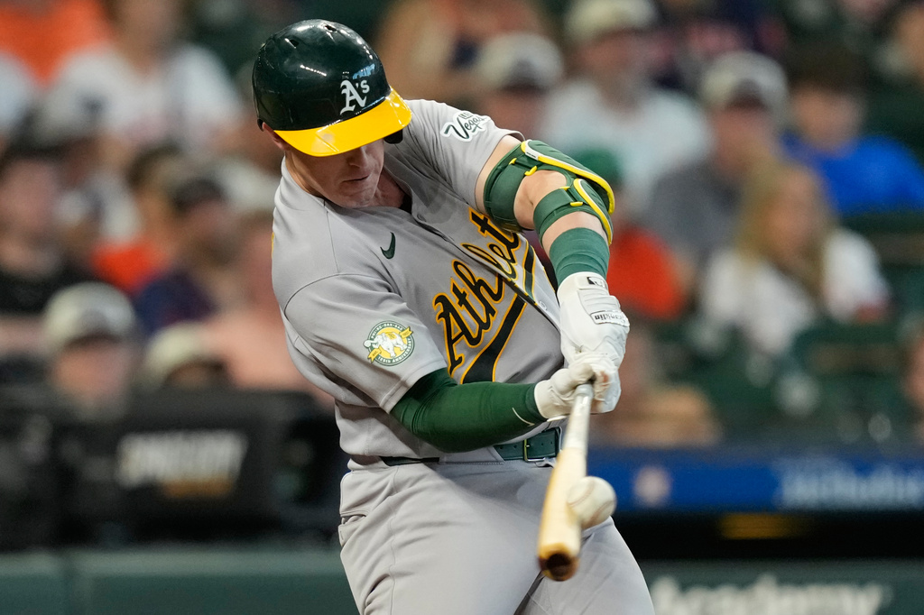Athletics' Brian Serven hits a three-run home run against the Houston Astros during the fifth inning of a baseball game Sunday, Aug. 23, 2026, in Houston. (AP Photo/David J. Phillip)