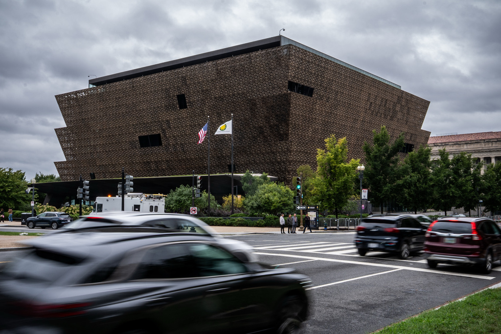 Cars drive past Smithsonian's National Museum of African American History and Culture, Wednesday, Sept. 23, 2026, in Washington. (AP Photo/Julia Demaree Nikhinson)