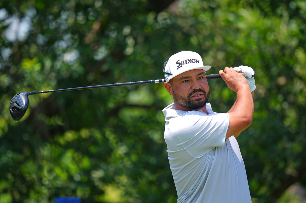 J.J. Spaun watches his tee shot on the ninth hole during the first round of the Charles Schwab Challenge golf tournament at Colonial Country Club in Fort Worth, Texas, Thursday, May 28, 2026. (AP Photo/LM Otero)