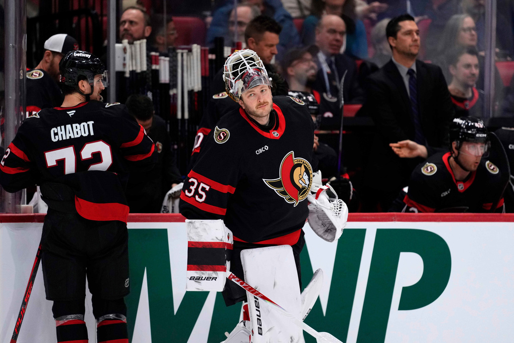 Ottawa Senators goaltender Linus Ullmark (35) heads to the net before the first period of an NHL hockey game in Ottawa, on Saturday, Jan. 31, 2026. (Justin Tang/The Canadian Press via AP)