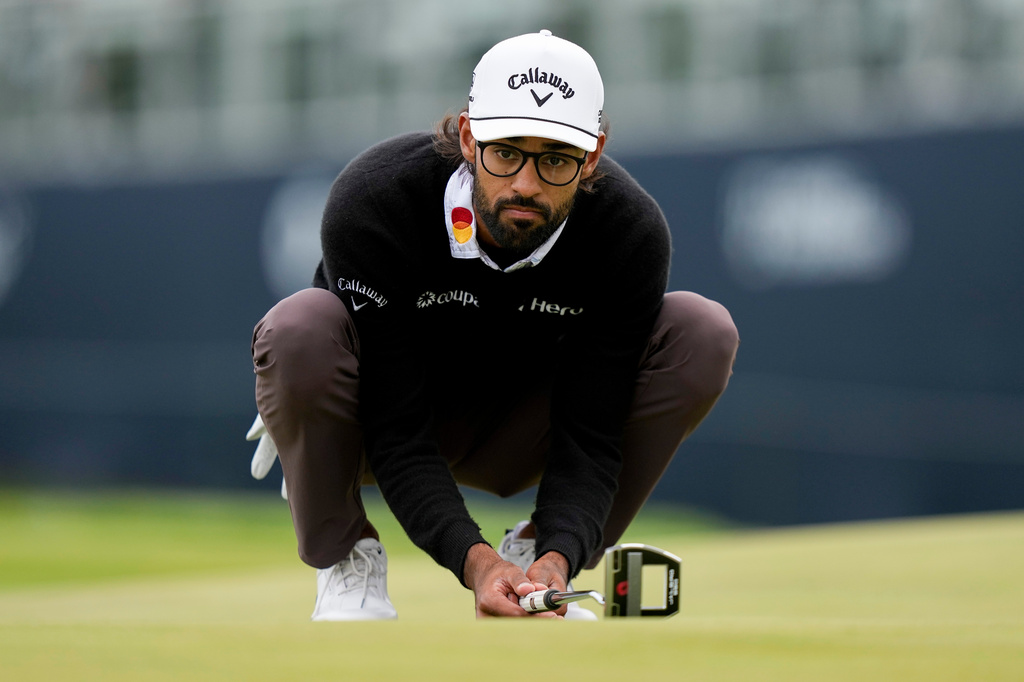 Akshay Bhatia lines up his shot on the 14the green during the first round of the PGA Championship golf tournament at Aronimink Golf Club, Thursday, May 14, 2026, in Newtown Square, PA. (AP Photo/Matt Slocum)