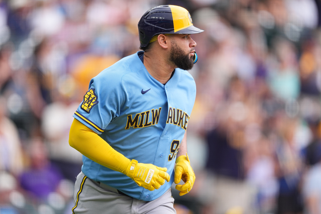 Milwaukee Brewers' Gary Sánchez heads up the first base line after hitting a two-run home run off Colorado Rockies relief pitcher Jaden Hill in the sixth inning of a baseball game Sunday, June 7, 2026, in Denver. (AP Photo/David Zalubowski)