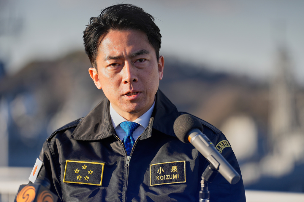 FILE - Japan's Defense Minister Shinjiro Koizumi speaks with media at the headquarters of the Japan Maritime Self-Defense Force Yokosuka District, south of Tokyo, on Jan. 30, 2026. (AP Photo/Eugene Hoshiko, Pool, File)
