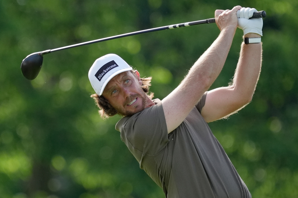 Tommy Fleetwood, of England, hits from the 18th tee during the second round of the Memorial golf tournament in Dublin, Ohio, Friday, June 5, 2026. (AP Photo/Sue Ogrocki)