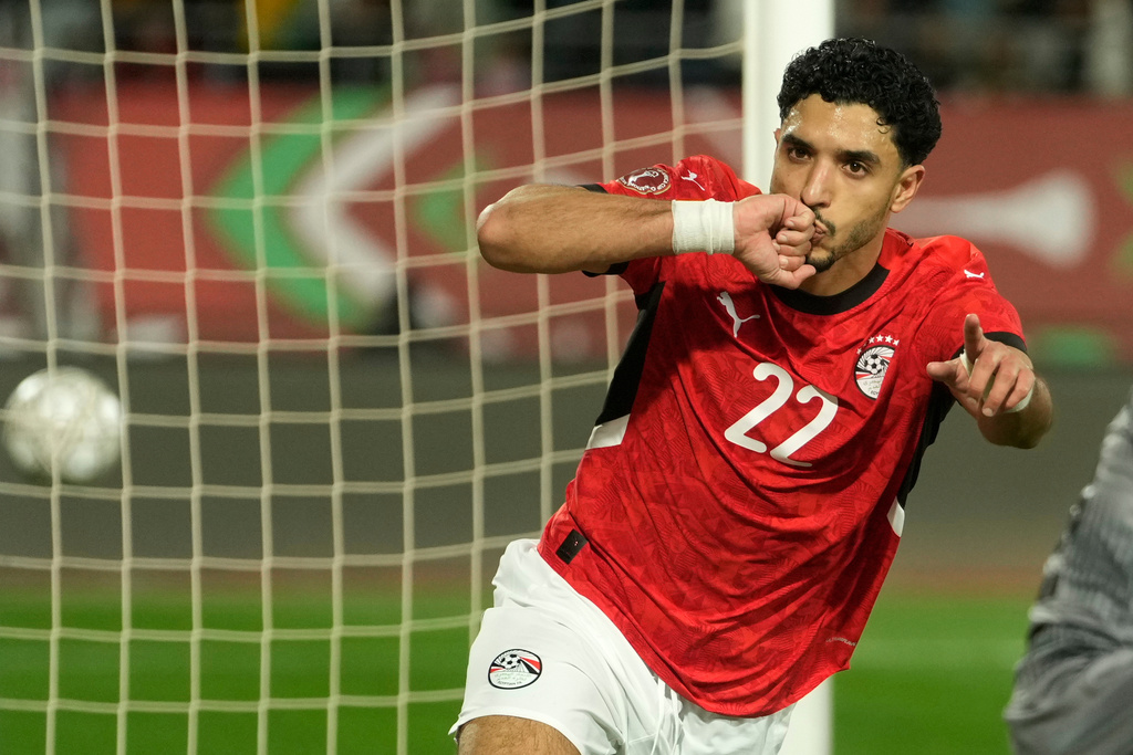 Egypt's Omar Marmoush celebrates after scoring during the Africa Cup of Nations group B soccer match between Egypt and Zimbabwe in Agadir, Morocco, Monday, Dec. 22, 2025. (AP Photo/Mosa'ab Elshamy)