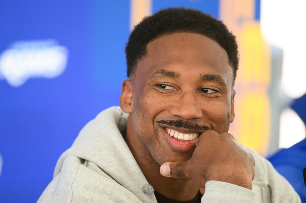 Los Angeles Rams defensive end Myles Garrett smiles during a press conference following the NFL football team's practice, Tuesday, June 2, 2026, in Woodland Hills, Calif. (AP Photo/Kyusung Gong)