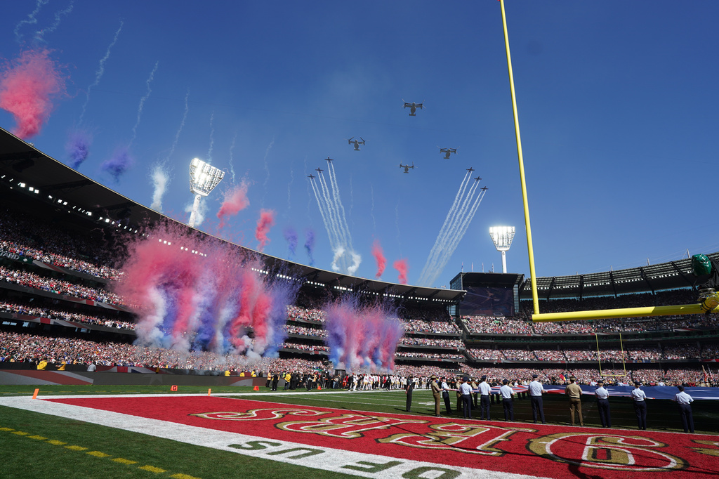 Aircraft flyover before an NFL football game between the Los Angeles Rams and the San Francisco 49ers, Friday, Sept. 11, 2026, in Melbourne, Australia. (AP Photo/Scott Barbour)
