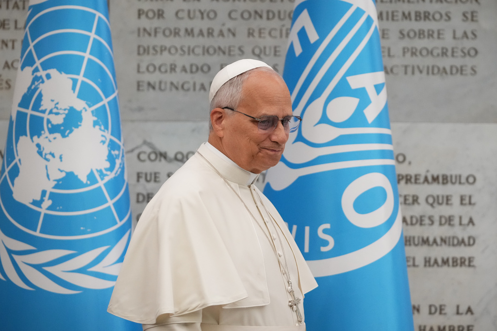 Pope Leo XIV leaves the Global World Food Day Ceremony in Rome, Thursday, Oct. 16, 2025. (AP Photo/Alessandra Tarantino)