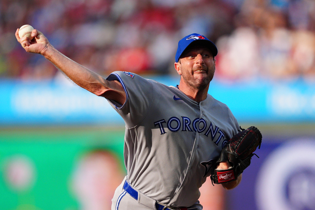 Toronto Blue Jays pitcher Max Scherzer throws during the first inning of a baseball game against the Philadelphia Phillies, Saturday, Aug. 8, 2026, in Philadelphia. (AP Photo/Derik Hamilton)
