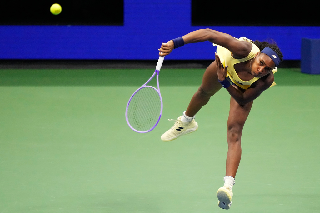 Coco Gauff, of the United States, serves to Elena Rybakina, of Kazakhstan, during the women's singles semifinals of the U.S. Open tennis championships, Thursday, Sept. 10, 2026, in New York. (AP Photo/Yuki Iwamura)