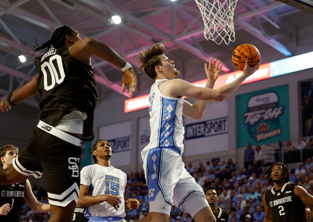 North Carolina center Henri Veesaar shoots the ball in front of St. Bonaventure forward Frank Mitchell during the first half of an NCAA college basketball game, Tuesday, Nov. 25, 2025 in Ft. Myers, Fla. (AP Photo/Scott Audette)