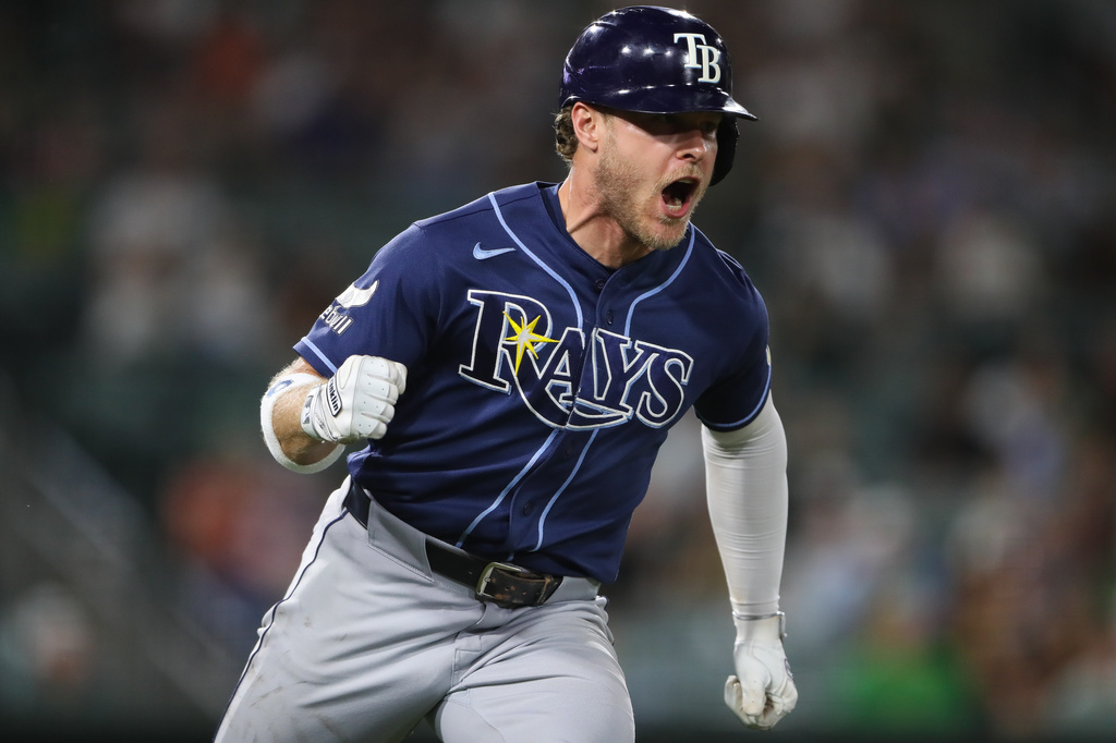 Tampa Bay Rays' Taylor Walls reacts as he heads towards first base on a two RBI single during the eighth inning of a baseball game against the Athletics Monday, Aug. 10, 2026, in West Sacramento, Calif. (AP Photo/Scott Marshall)