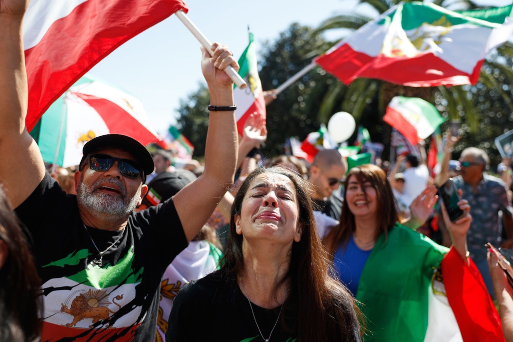 Demonstrators gather in reaction to the U.S. and Israeli strikes on Iran on Saturday, Feb. 28, 2026, in Los Angeles. (AP Photo/Caroline Brehman)