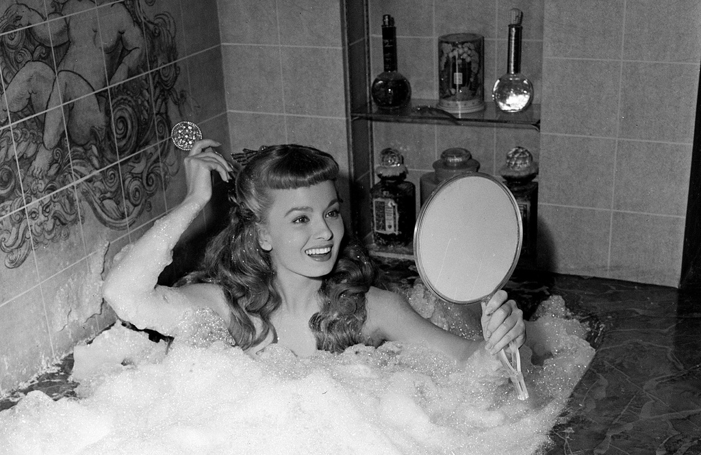 FILE - Actress Ann Blyth takes a bubble bath in her role as a captive mermaid on the set of the comedy production "Mr. Peabody and the Mermaid," April 17, 1948, in Los Angeles, Calif. (AP Photo, File)