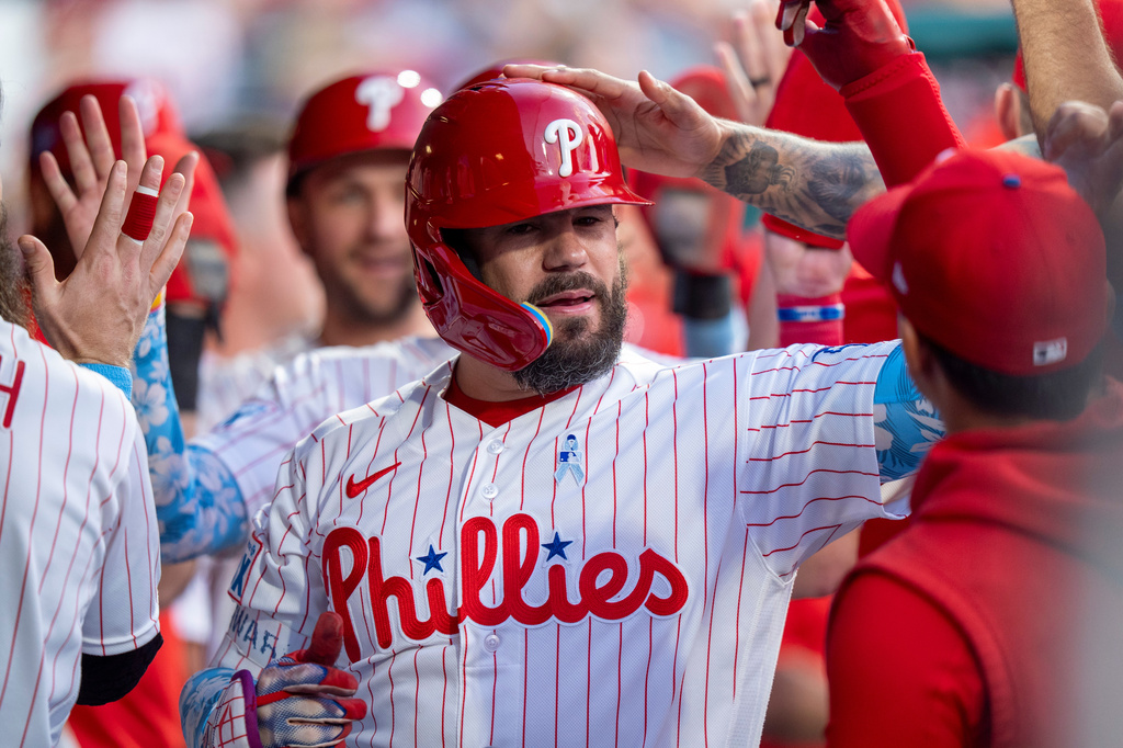 Philadelphia Phillies' Kyle Schwarber celebrates with teammates after his three-run home run during the second inning of a baseball game against the New York Mets, Sunday, June 21, 2026, in Philadelphia. (AP Photo/Chris Szagola)