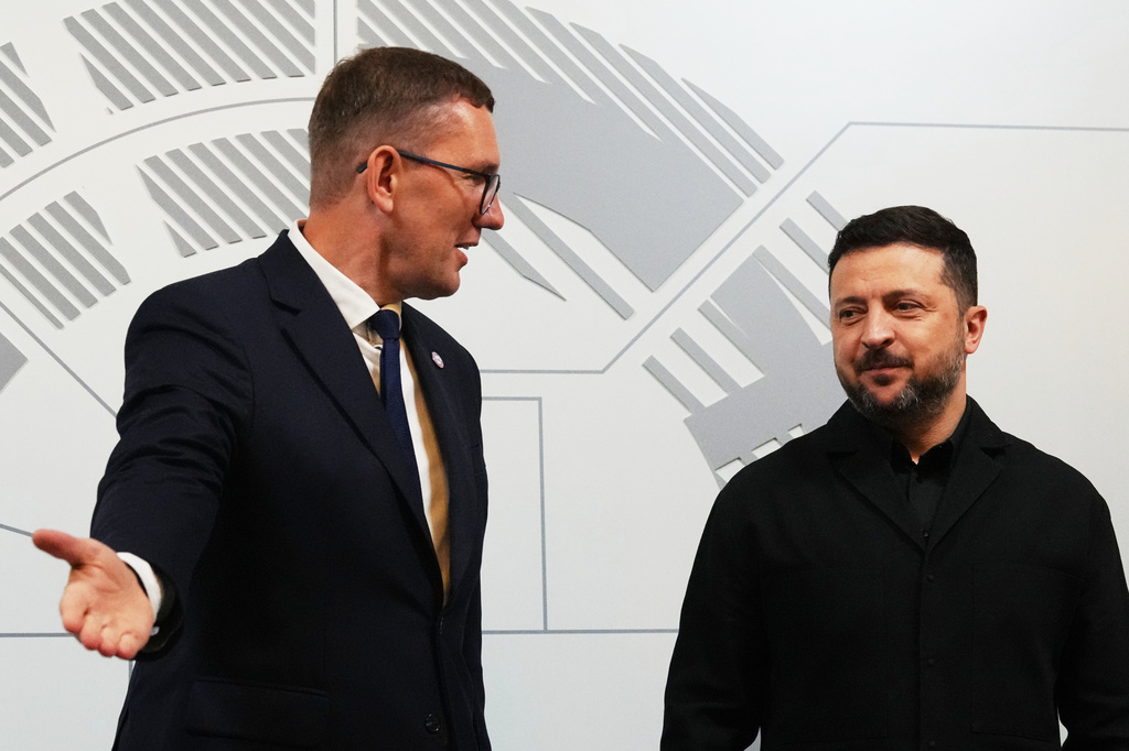 Estonia's Prime Minister Kristen Michal, left, and Ukraine's President Volodymyr Zelenskyy attend a Nordic and Baltic countries meeting in Tallinn, Estonia, Tuesday, June 9, 2026. (AP Photo/Sergei Grits)