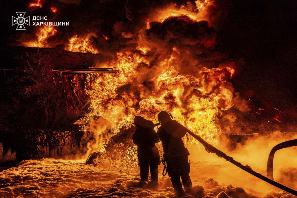 FILE - In this photo provided by the Ukrainian Emergency Service, emergency services personnel work to extinguish a fire following a Russian attack in the Kharkiv region, Ukraine, July 5, 2025. (Ukrainian Emergency Service via AP, File)