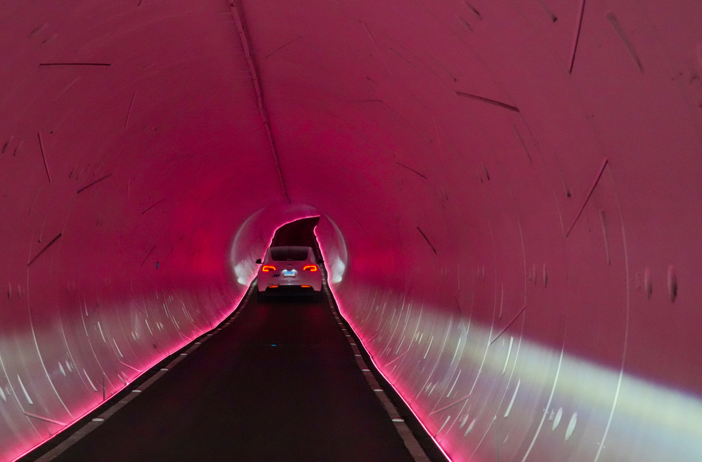A Tesla is driven through the Vegas Loop under the city on Wednesday, Feb. 4, 2026, in Las Vegas. (AP Photo/Ty ONeil)