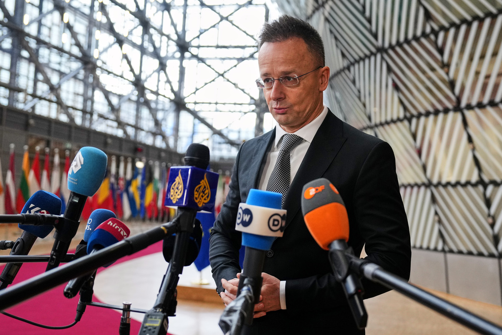 Hungary's Foreign Minister Peter Szijjarto speaks with the media as he arrives for a meeting of EU foreign ministers at the European Council building in Brussels, Monday, Feb. 23, 2026. (AP Photo/Virginia Mayo)