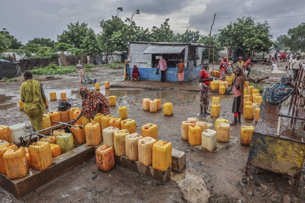 Women fetch water in Batil, Maban, South Sudan, Wednesday, Aug. 20, 2025. (AP Photo/Caitlin Kelly)