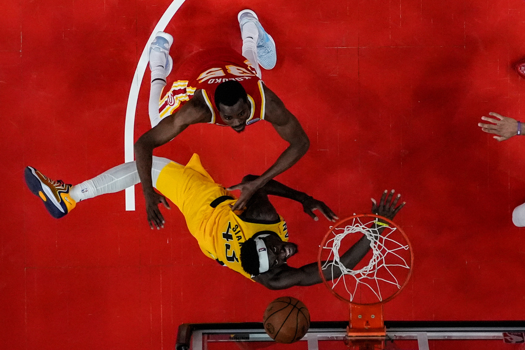 Indiana Pacers forward Pascal Siakam (43) shoots against Atlanta Hawks center Christian Koloko (35) during the second half of an NBA basketball game, Monday, Jan. 26, 2026, in Atlanta. (AP Photo/Mike Stewart)