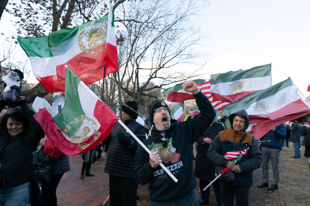 Activists take part in a rally supporting protesters in Iran at Lafayette Park, across from the White House, in Washington, Sunday, Jan. 11, 2026. (AP Photo/Jose Luis Magana)