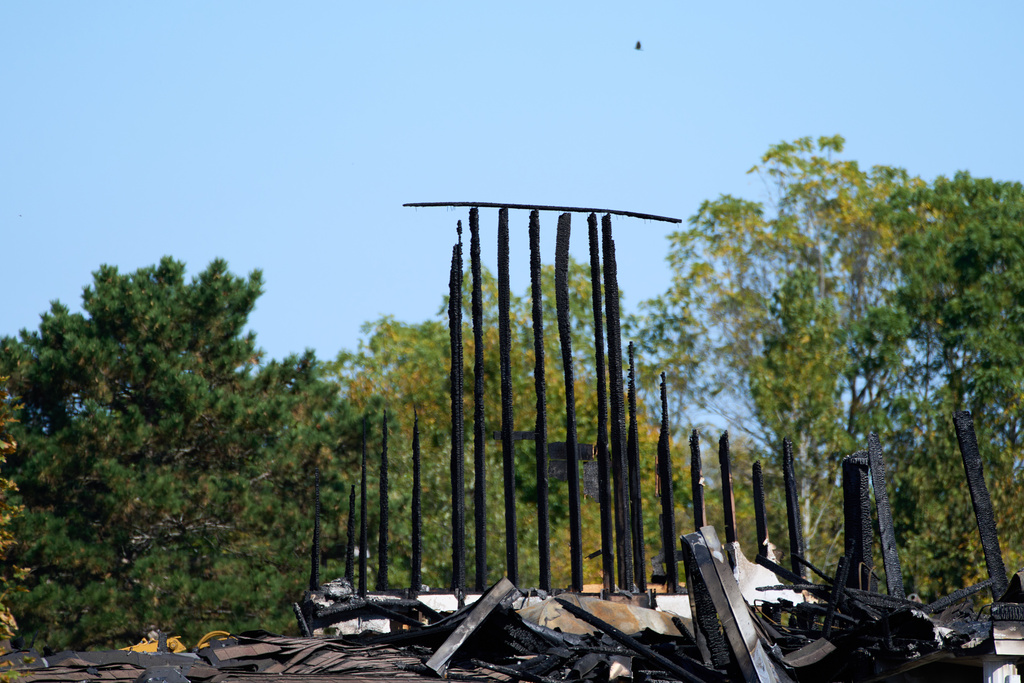 The Church of Jesus Christ of Latter-day Saints in Grand Blanc Township, Mich. is seen where Sunday morning a man rammed his vehicle into the building before opening fire and setting the building ablaze, Tuesday, Sept. 30, 2025. (AP Photo/Ryan Sun)