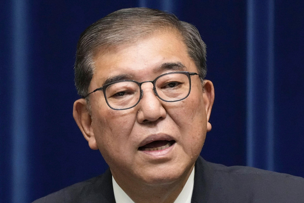 Japanese Prime Minister Shigeru Ishiba speaks during a press conference at the prime minister's office in Tokyo, Japan, Sunday, Sept. 7, 2025. (Kyodo News via AP)
