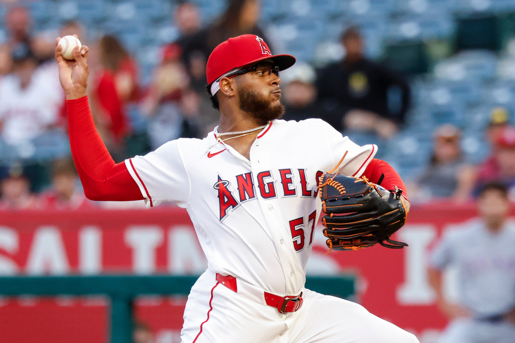 Los Angeles Angels starting pitcher Walbert Urena (57) throws during the first inning of a baseball game against the Texas Rangers, Thursday, Aug. 13, 2026, in Anaheim, Calif. (AP Photo/Caroline Brehman)