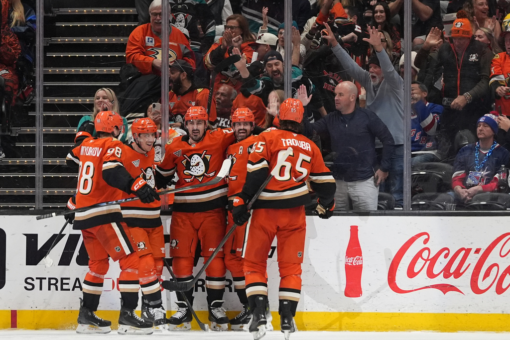 Anaheim Ducks left wing Alex Killorn, second from right, celebrates his goal with teammates during the second period of an NHL hockey game against the New York Rangers Monday, Jan. 19, 2026, in Anaheim, Calif. (AP Photo/Gregory Bull)