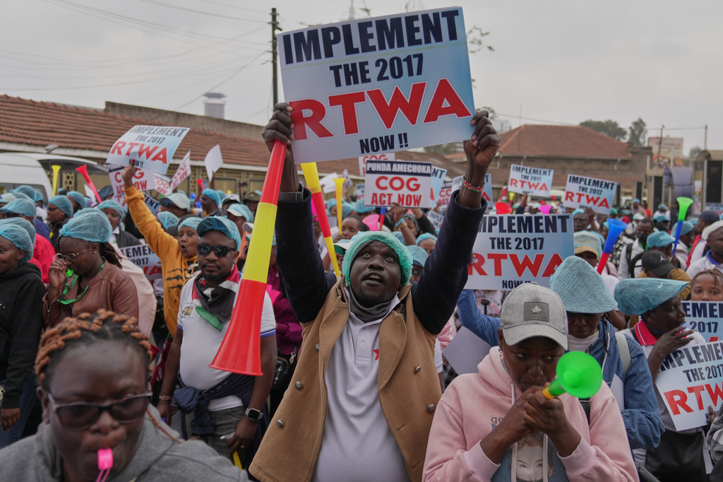 Kenyan nurses and other health workers demonstrate over low pay in Nairobi, Kenya Tuesday, Sept. 8, 2026. (AP Photo/Brian Inganga)