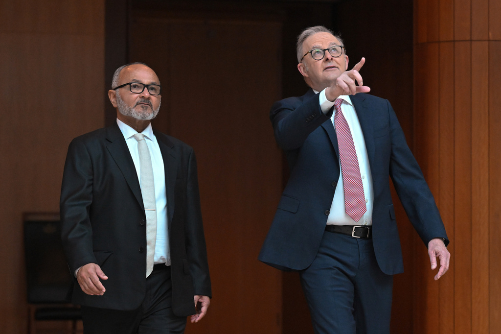 Solomon Islands Prime Minister Matthew Wale, left, and Australian Prime Minister Anthony Albanese walk together at Parliament House in Canberra, Wednesday, June 3, 2026. (Mick Tsikas/AAP Image via AP)