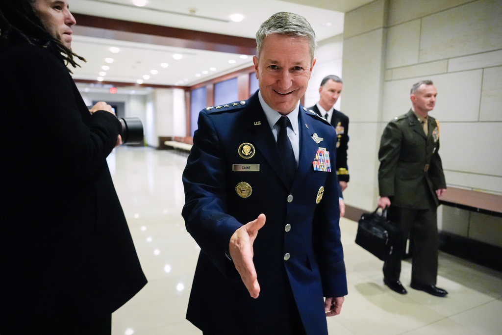 Chairman of the Joint Chiefs Air Force Gen. Dan Caine arrives to brief members of Congress on military strikes near Venezuela, Tuesday, Dec. 16, 2025, at the Capitol in Washington. (AP Photo/Julia Demaree Nikhinson)