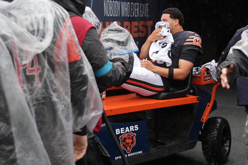 Chicago Bears quarterback Caleb Williams is carted off the field after an injury during the second half of an NFL football game against the Minnesota Vikings in Chicago, Sunday, Sept. 20, 2026. (AP Photo/Nam Y. Huh)
