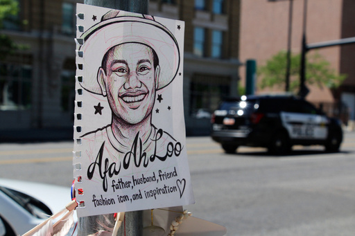 FILE - A makeshift memorial for Arthur Folasa Ah Loo, known to friends and family as Afa, is seen, June 17, 2025, in downtown Salt Lake City, on the block where Ah Loo was fatally shot during a "No Kings" protest on Saturday, June 14. (AP Photo/Hannah Schoenbaum, file) FILE - A makeshift memorial for Arthur Folasa Ah Loo, known to friends and family as Afa, is seen, June 17, 2025, in downtown Salt Lake City, on the block where Ah Loo was fatally shot during a "No Kings" protest on Saturday, June 14. (AP Photo/Hannah Schoenbaum, file)