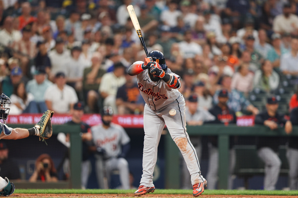 Detroit Tigers' Gleyber Torres is hit by a pitch in the eighth inning of a baseball game against the Seattle Mariners, Wednesday, Aug. 5, 2026, in Seattle. (AP Photo/Kevin Ng)