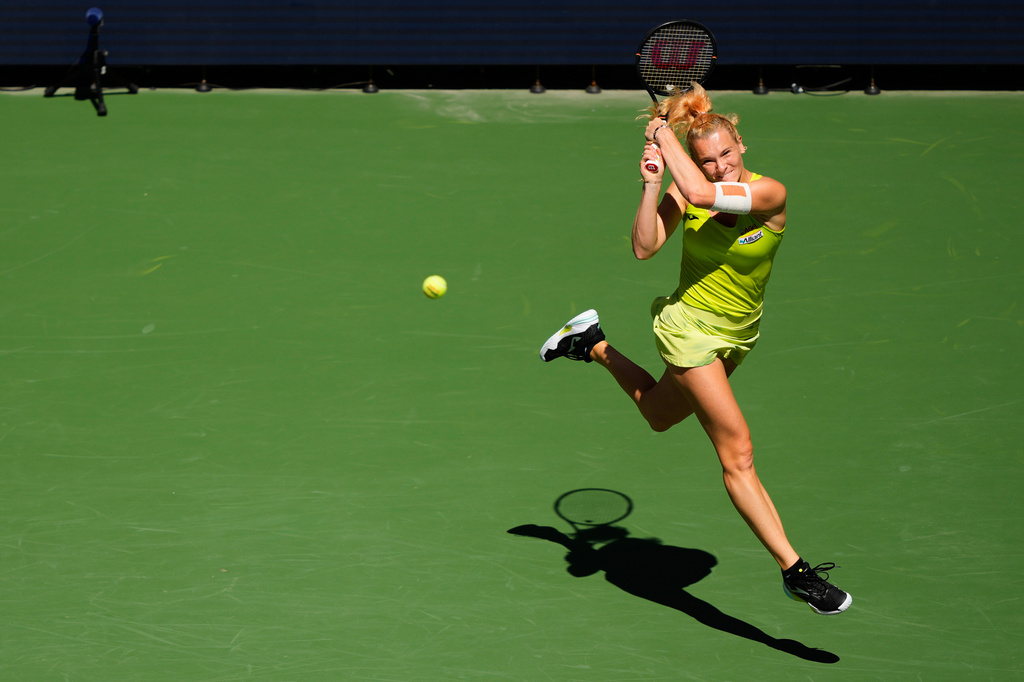 Katerina Siniakova, of the Czech Republic, returns the ball during a mixed doubles match at the U.S. Open tennis championships, Tuesday, Aug. 25, 2026, in New York. (AP Photo/Yuki Iwamura)