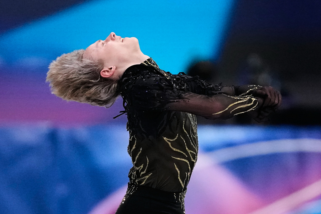 Ilia Malinin of the United States competes during the men's free skate program in figure skating at the 2026 Winter Olympics, in Milan, Italy, Friday, Feb. 13, 2026. (AP Photo/Natacha Pisarenko)