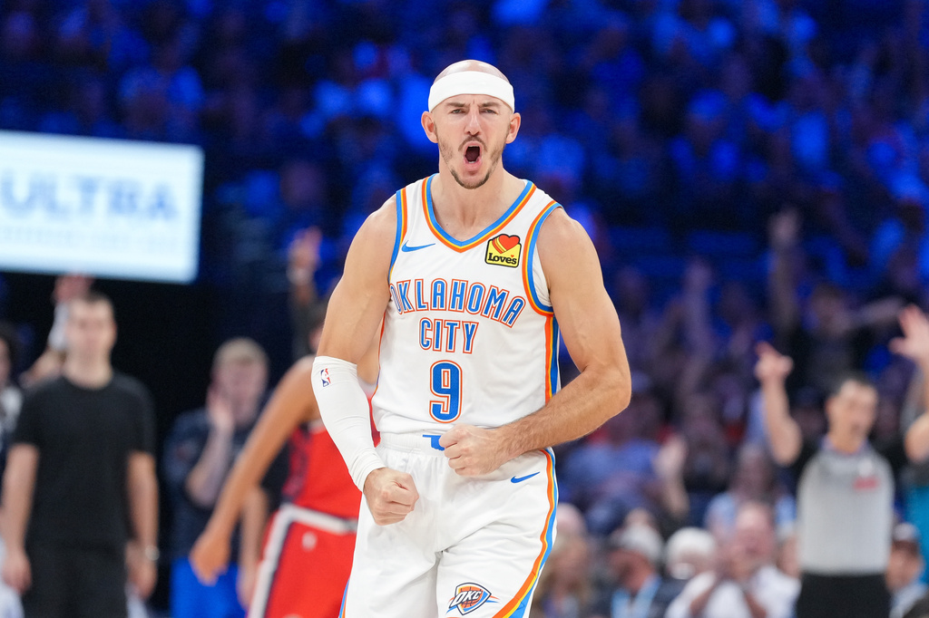 Oklahoma City Thunder guard Alex Caruso celebrates a basket during the second half of an NBA basketball game against the Los Angeles Clippers, Sunday, Oct. 25, 2026, in Oklahoma City. (AP Photo/Kyle Phillips)