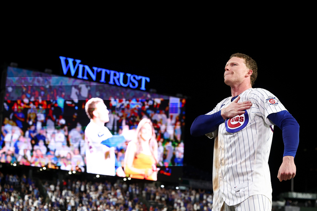 Chicago Cubs' Pete Crow-Armstrong gestures toward the crowd after hitting a walkoff home run during the 10th inning of a baseball game to defeat the Chicago White Sox in Chicago, Monday, Aug. 17, 2026. (AP Photo/Jessie Alcheh)