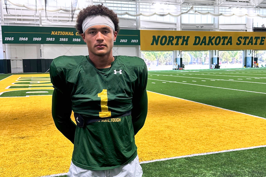 North Dakota State linebacker Donovan Woolen poses Monday, Aug. 17, 2026, inside the team's practice facility in Fargo, N.D. (AP Photo/Dave Campbell)