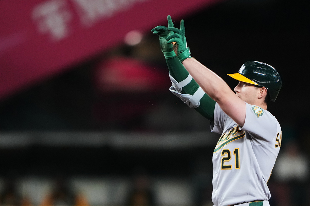 Athletics' Tyler Soderstrom celebrates a double against the Seattle Mariners during the sixth inning of a baseball game, Tuesday, April 21, 2026, in Seattle. (AP Photo/Lindsey Wasson)