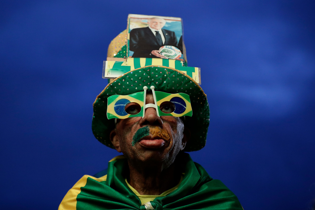 A Brazil fan poses before watching the World Cup match between Brazil and Morocco at Copacabana beach in Rio de Janeiro, Brazil, Saturday, June 13, 2026. (AP Photo/Bruna Prado)