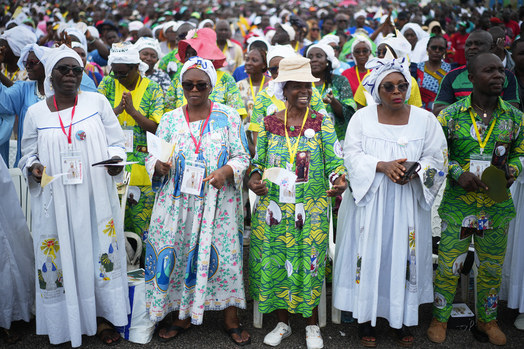 Faithful attend a Mass celebrated by Pope Leo XIV in the Japoma Stadium, in Douala, Cameroon, Friday, April 17, 2026 on the fifth day of his 11-day pastoral visit to Africa. (AP Photo/Andrew Medichini)