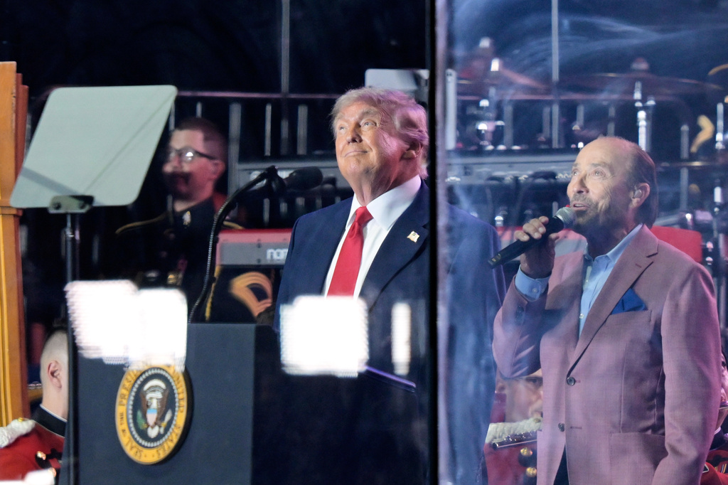 President Donald Trump watches a military flyover at the opening of the Great American State Fair on the National Mall, Wednesday, June 24, 2026, in Washington. (AP Photo/Rod Lamkey Jr.)