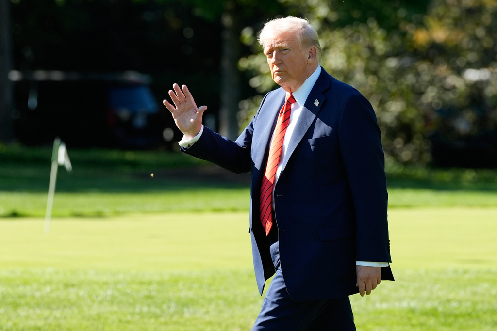 President Donald Trump walks to board Marine One on the South Lawn of the White House, Friday, Oct. 10, 2025, in Washington, as he heads to Walter Reed National Military Center. (AP Photo/Alex Brandon)