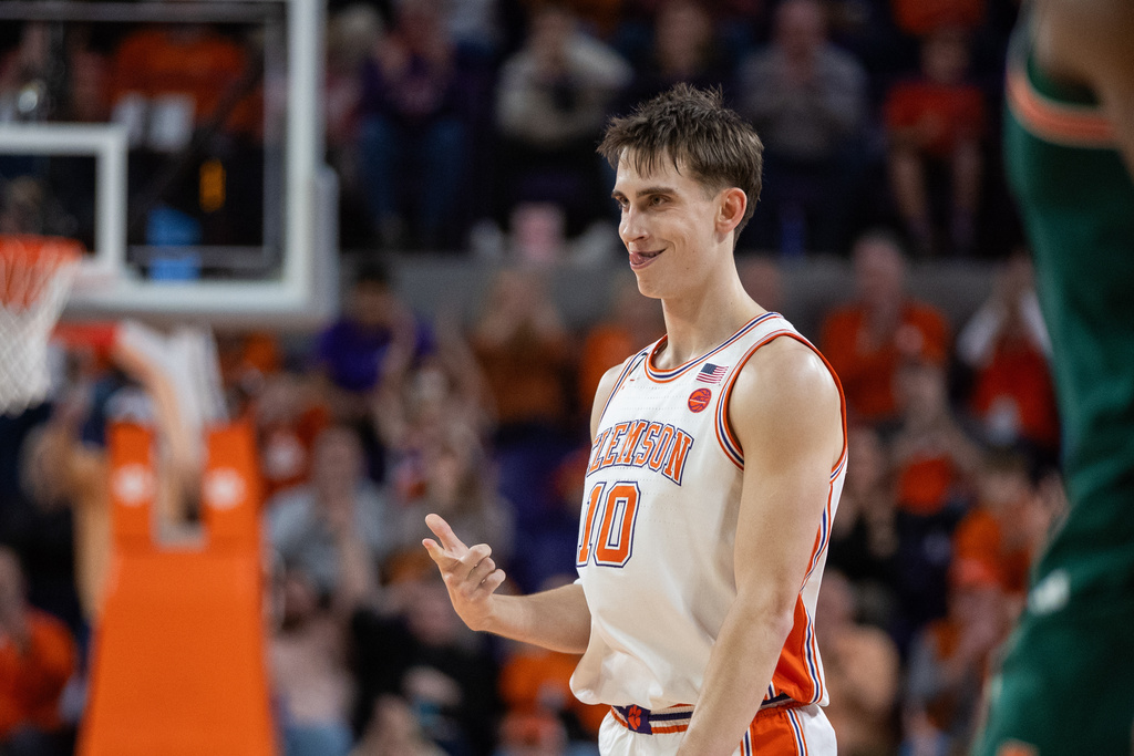 Clemson forward Jake Wahlin (10) celebrates a three point basket against Miami during the first half of an NCAA college basketball game Saturday, Jan. 17, 2026, in Clemson, S.C. (AP Photo/Scott Kinser)