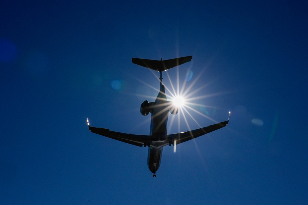 Aircraft jet making final approach before landing at Ronald Reagan National Airport, Wednesday, Jan. 21, 2026 in Arlington, Va. (AP Photo/Pablo Martinez Monsivais)